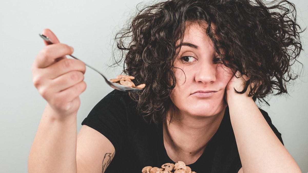 Gril eating cereal